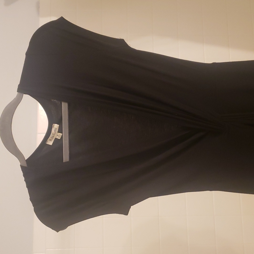 Black cotton dress with cap sleeves, deep V, slit, under skirt